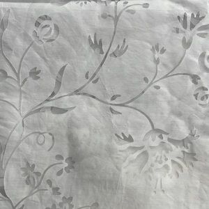 Set of two sheer curtain panels.